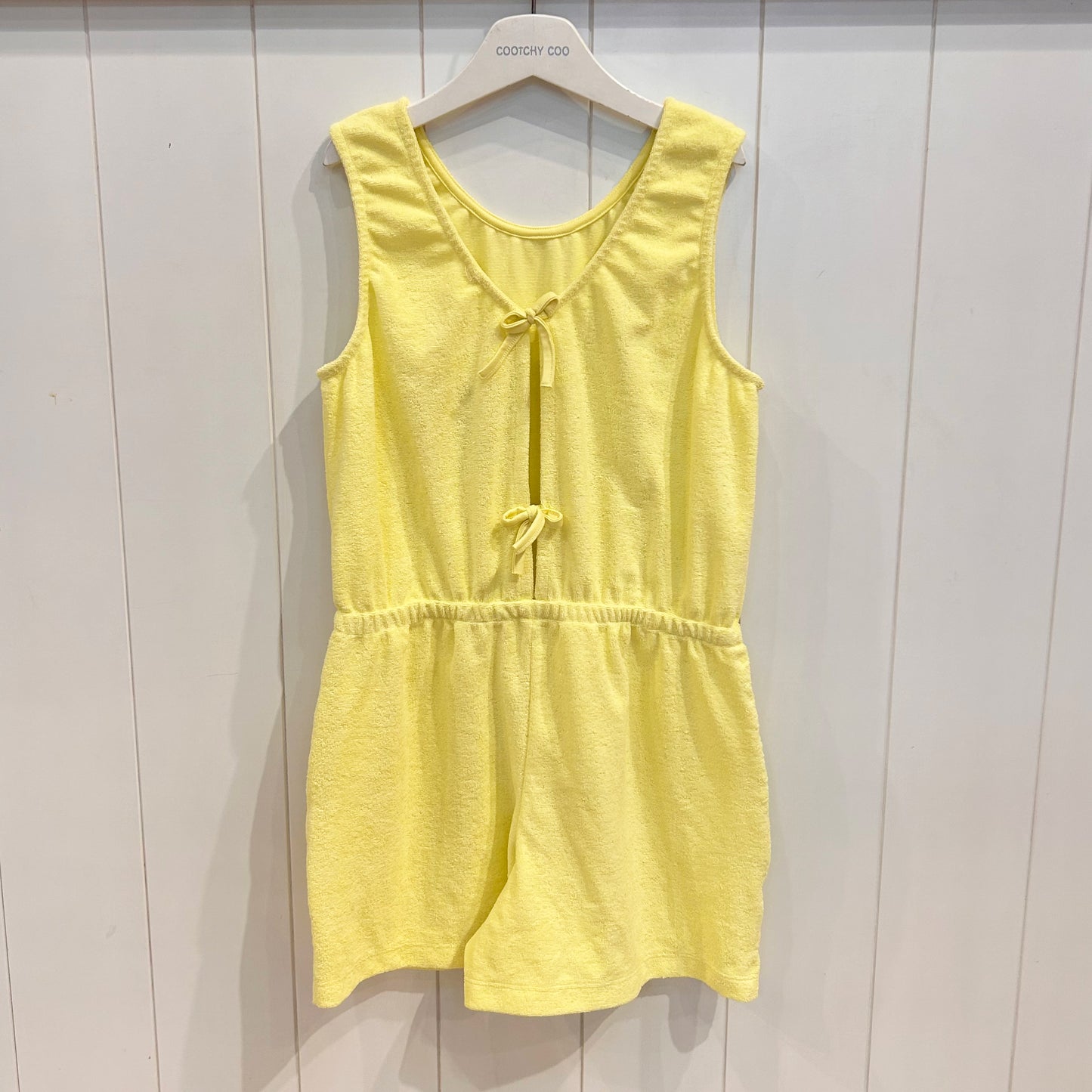 Mameluco towel moños amarillo