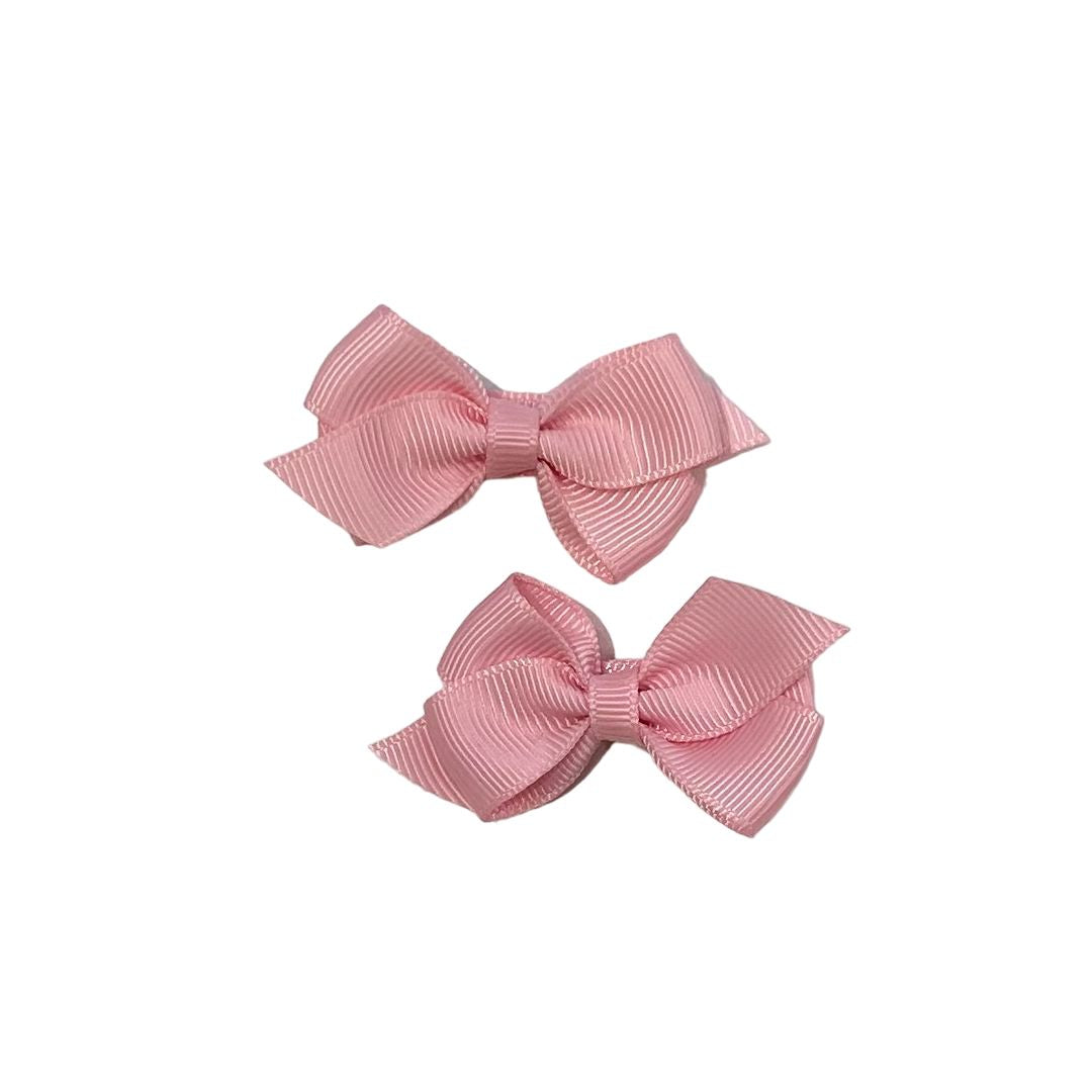 Pinza moñito par rosa chicle