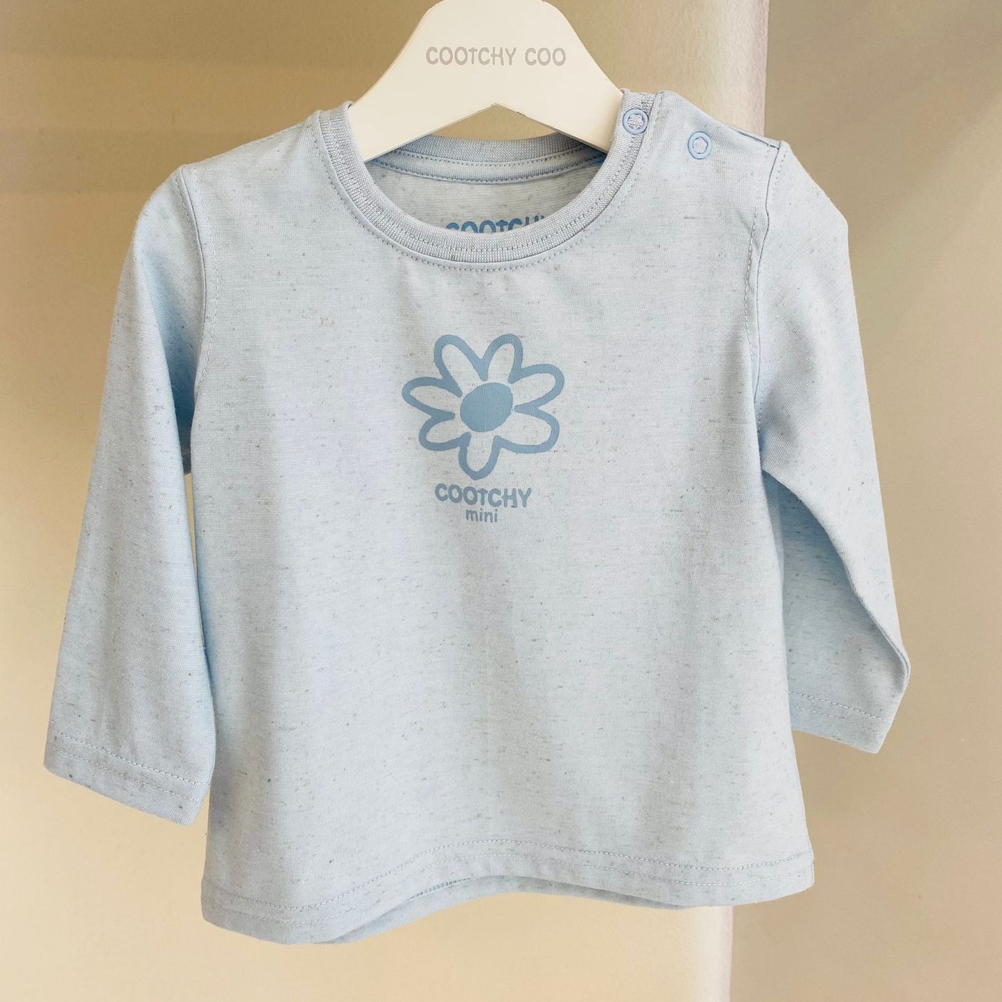 Remera Bebe Celeste con Flor