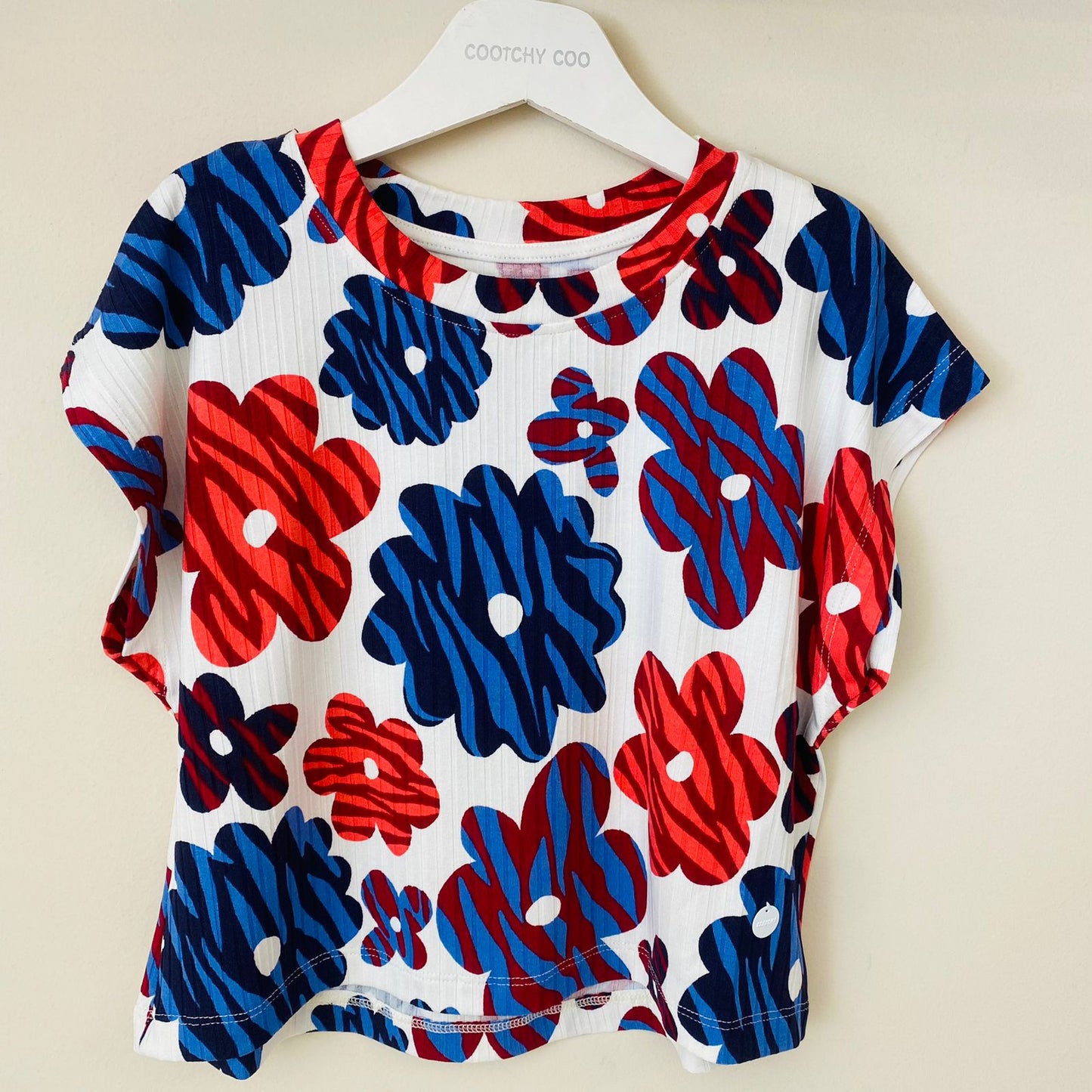 Remera Morley flores coral/azul