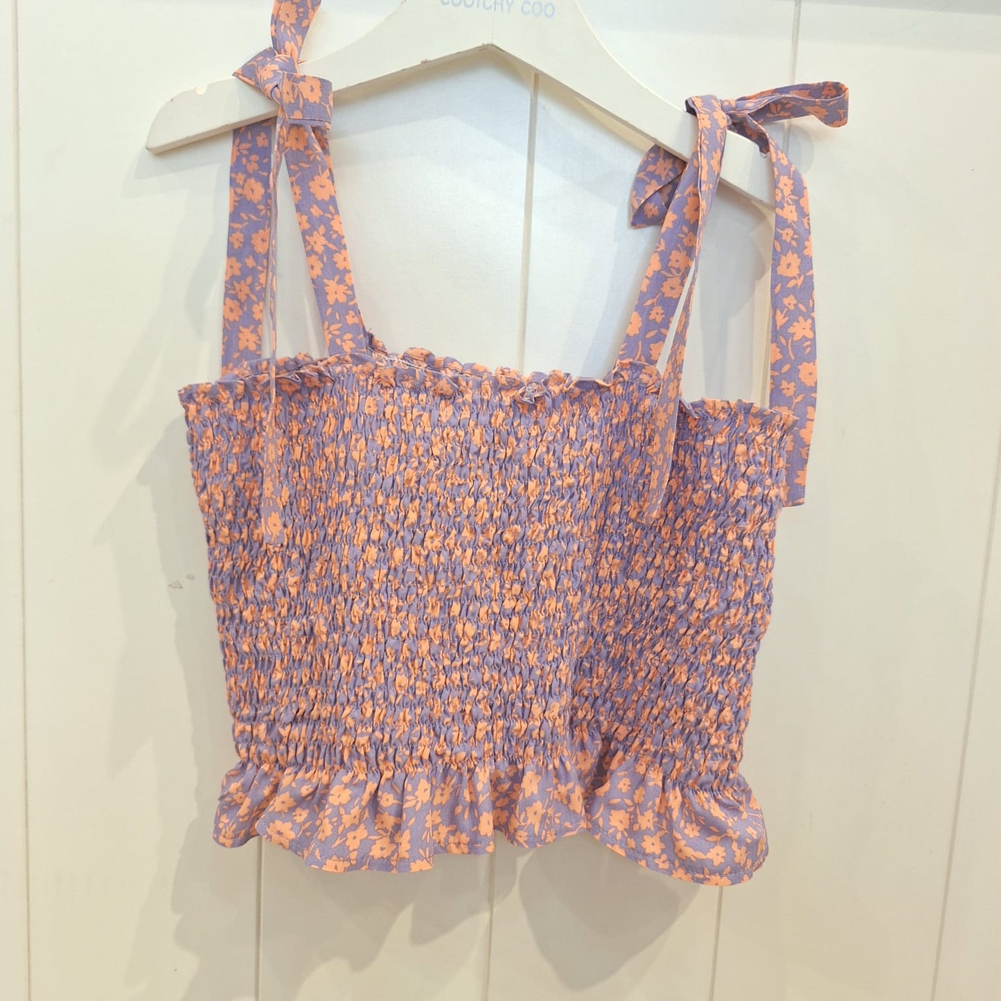 Top engomada flores lila