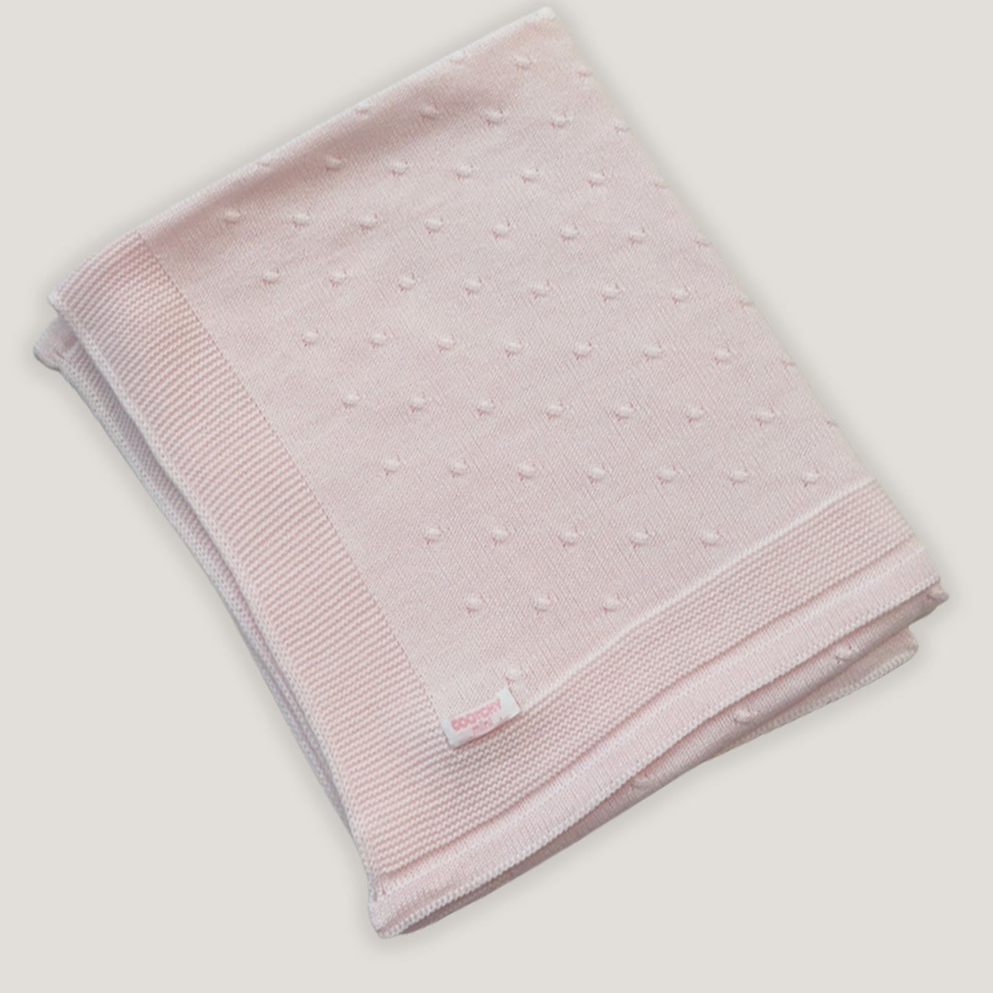 Manta gotas trenza rosa