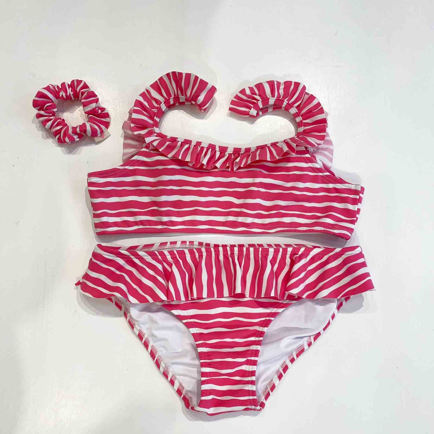Bikini c/volado rayas fuscia