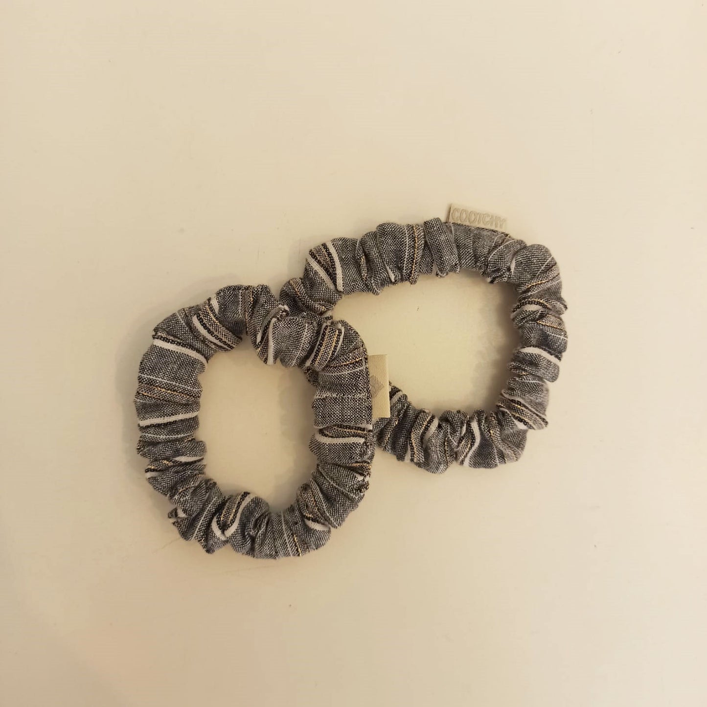 Goma brillito gris M