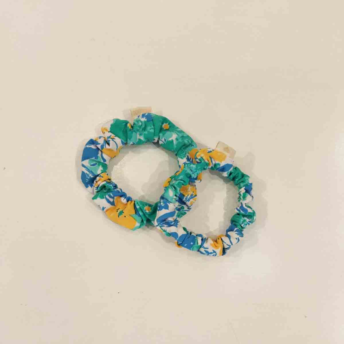 Goma flores amarillo azul P