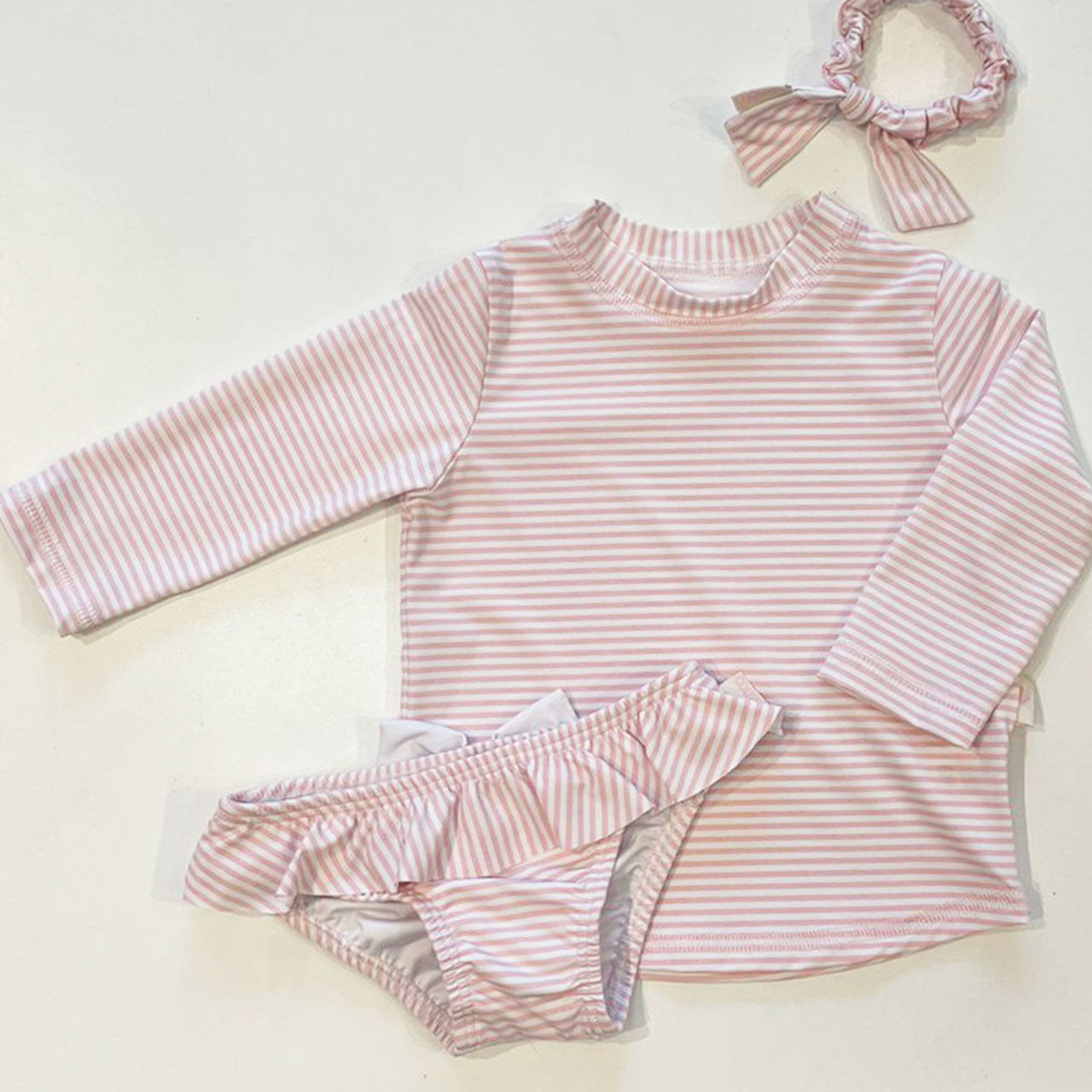 Remera de playa rayas rosa