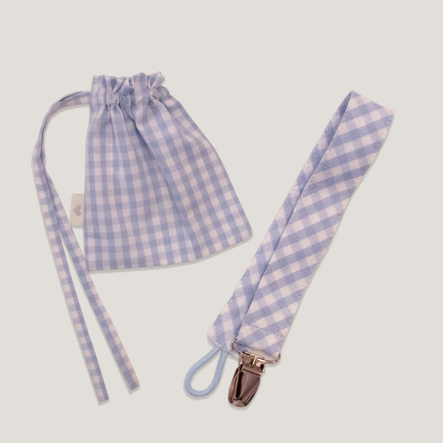 Bolsita + porta chupete cuadritos celestes