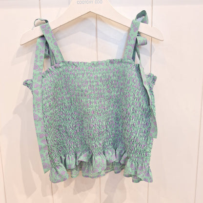 Top engomada flores verdes