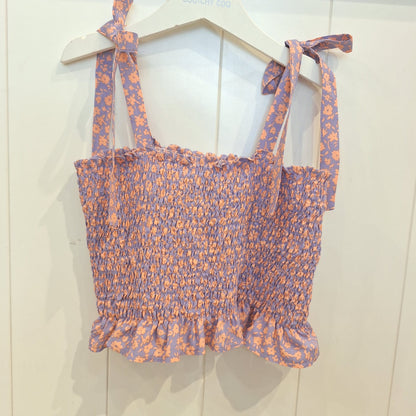 Top engomada flores lila